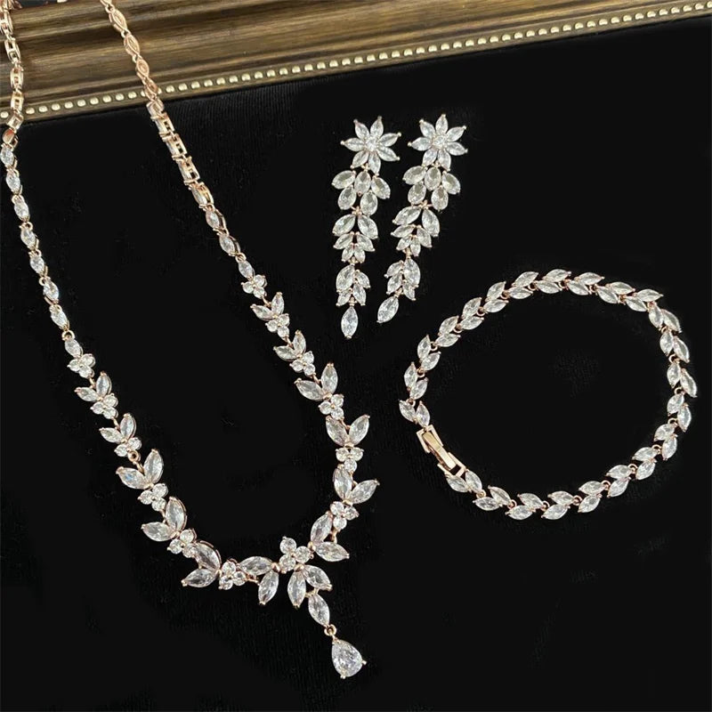 ZAKOL Luxury Cubic Zirconia Necklace Earrings Rings Set for Women Shinny Water Drop Leaf CZ Bridal Wedding Jewelry Sets