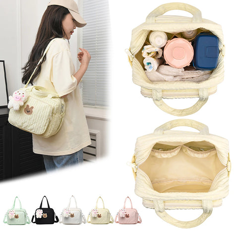 Mother with baby shoulder crossbody bag bottle diaper storage bag